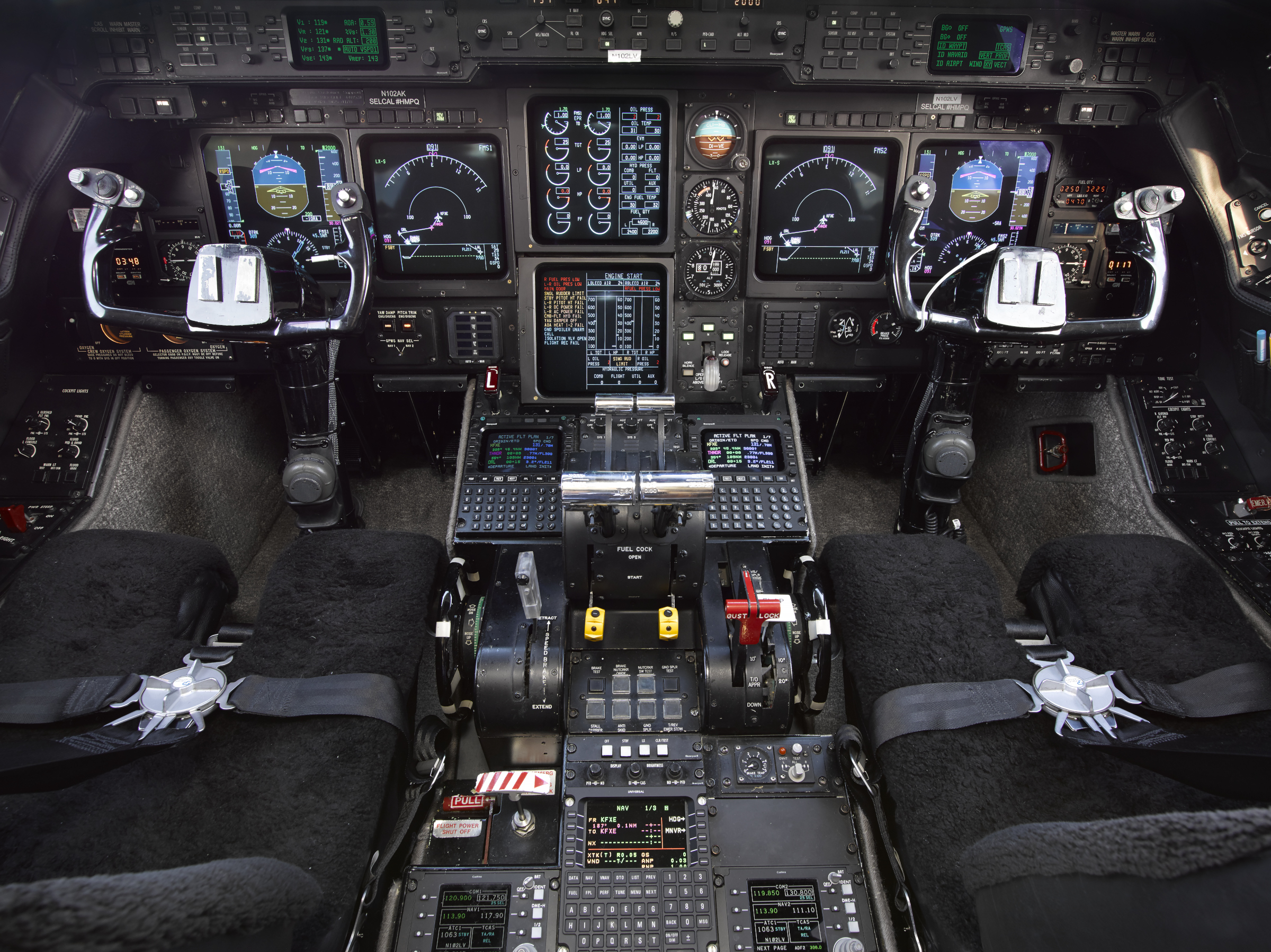 Flight deck of a business jet, showing the instruments and controls.
